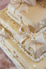 Wedding cake with ribbons and beads part