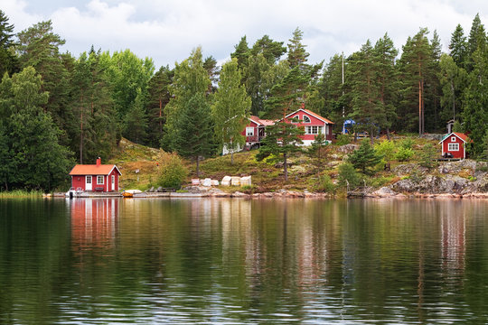 Typical red summer cottages in Stockholm archipelago.