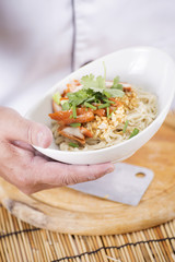 Chef present egg Noodle with roast chicken