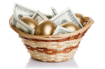 golden eggs and dollars in a basket isolated on white background