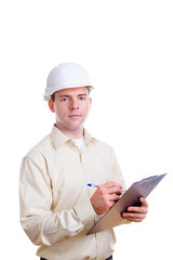 Engineer in helmet writing something