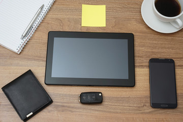 top view of office desk  with tablet computer and accessories