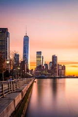 Muurstickers Lower Manhattan at sunset © mandritoiu