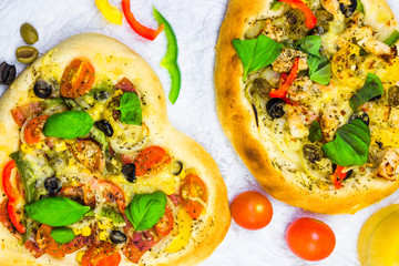 closeup pizza cheese meat vegetables