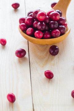Cranberries wooden spoon background berry