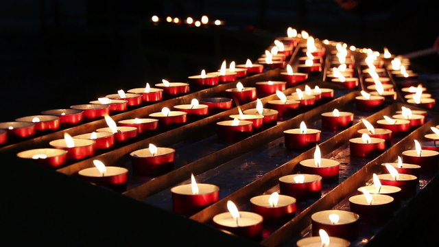 Burning candles in a church N1