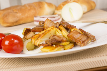 . fried potatoes with bacon