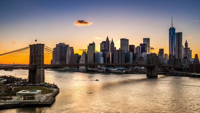 Sunset, dusk and night over the Brooklyn Bridge