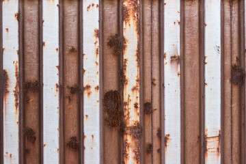 Old painted corroded metal container wall