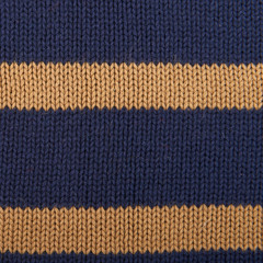 Texture of knitted wool cotton striped fabric.