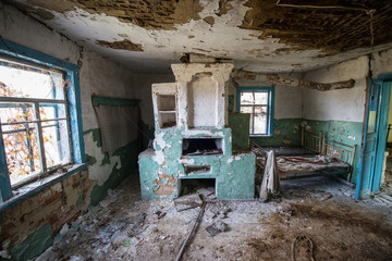 Fototapeta na wymiar Inside old cottage in Stechanka ghost village, Chernobyl Zone
