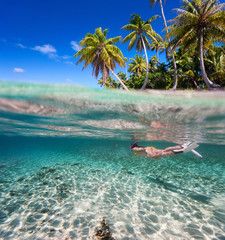 Woman swimming underwater