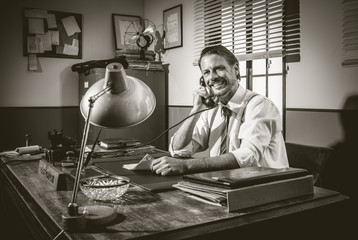 1950s office: director working on the phone