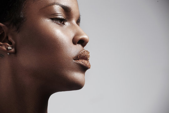 women's profile with a sugar lips