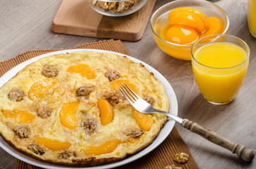 Sweet Egg omelet with walnuts and peaches