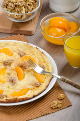 Sweet Egg omelet with walnuts and peaches