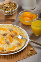Sweet Egg omelet with walnuts and peaches