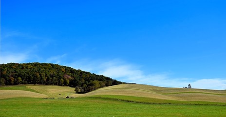 Fototapeta na wymiar Rolling Hills, Blue Sky