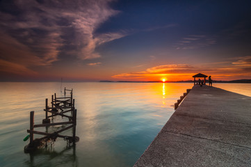 Fototapeta na wymiar Sunset at fishing jetty