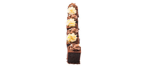 Bite sized chocolate cake with chocolate and cream cheese icing