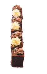 Bite sized chocolate cake with chocolate and cream cheese icing