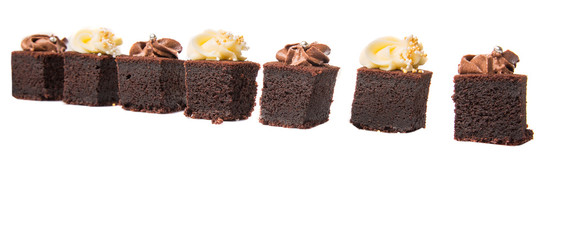 Bite sized chocolate cake with chocolate and cream cheese icing