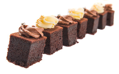 Bite sized chocolate cake with chocolate and cream cheese icing