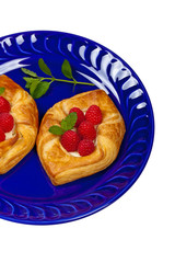 Raspberry pastries isolated on white background