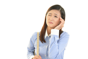 頭痛を訴える女性