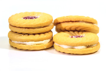 Fototapeta na wymiar Sandwich biscuits on white background