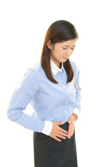 腹痛を訴える女性