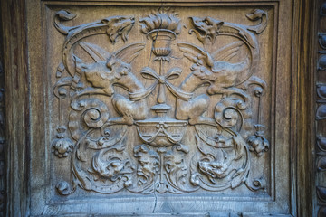 old wooden door with carvings