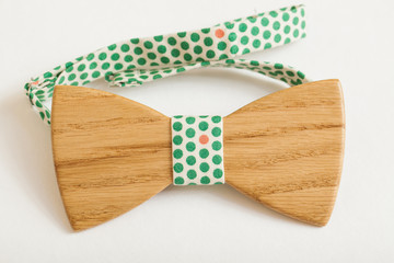 Fragment man suit hipster wooden bow tie on the shirt.