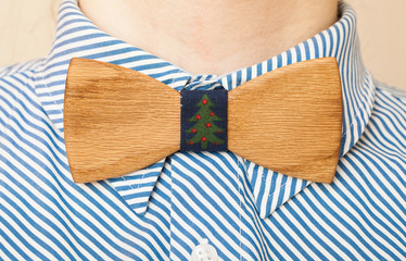 Fragment man suit hipster wooden bow tie on the shirt.