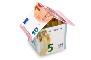 House made of money on a white background