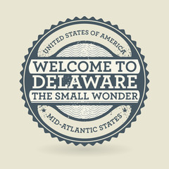 Grunge rubber stamp with text Welcome to Delaware, USA