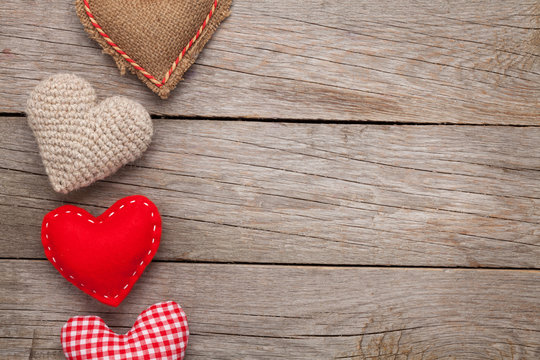 Valentines day background with handmade toy hearts - Powered by Adobe