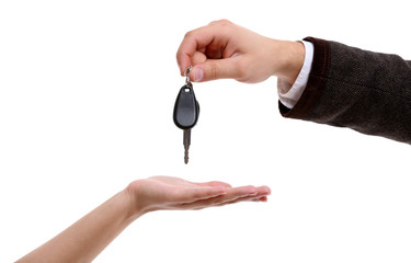 Businessman holding car key isolated on white