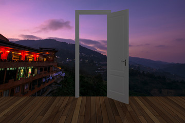 Landscape behind the opening door