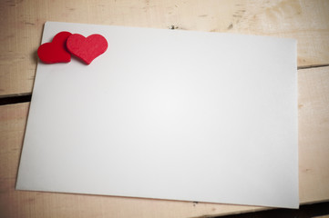 red heart on a white envelope