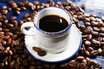 Cup of coffee on wooden table