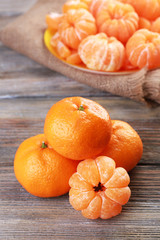 Tangerines on wooden table