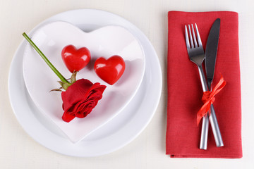 Festive table setting for Valentines Day on light background