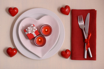 Festive table setting for Valentines Day on light background