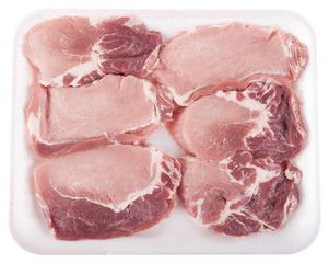 raw meet in white pack. isolated on white background.