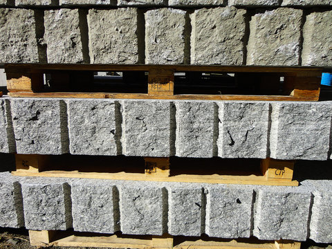 Rough blocks of granite in a yard