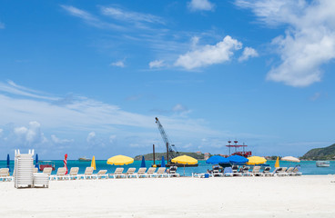 Fototapeta na wymiar Beach Umbrellas and Crane