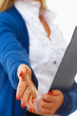 Young woman with folder offering handshake isolated. Focus on