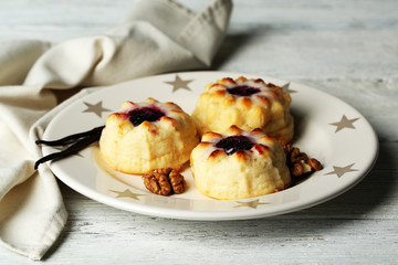 Delicious cheesecakes on wooden table