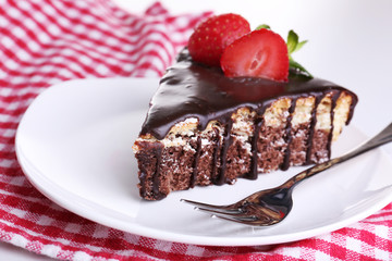 Chocolate cake on napkin, close-up